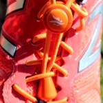 Stopper orange Laufschuh 2